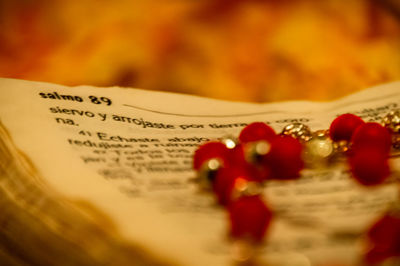 Close-up of text on paper on table