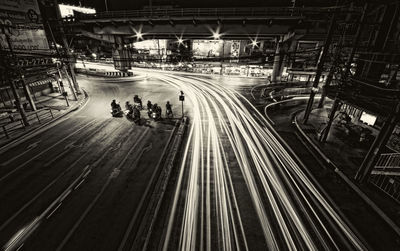 High angle view of light trails on road