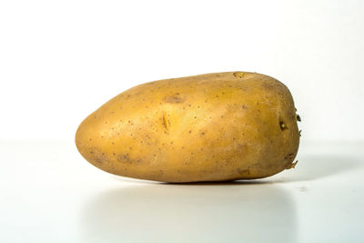 Close-up of apple against white background