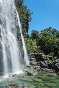 Scenic view of earland falls waterfall against clear sky