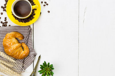 High angle view of coffee cup on table