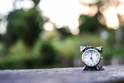 Close-up of clock against blurred background