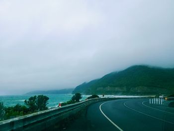 Empty road against sky