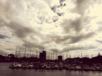 Boats moored at harbor