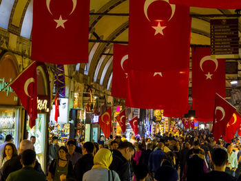 People on street in city at night