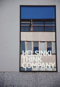 Low angle view of text on building