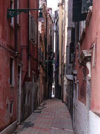 Alley amidst residential buildings