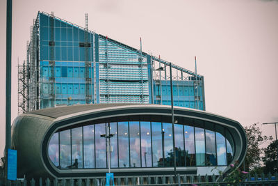 Low angle view of city against clear sky