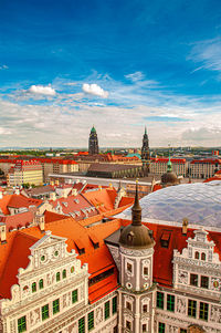 Buildings in city against sky