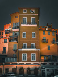 High angle view of buildings in city at night