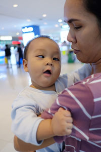 Woman with baby in mall