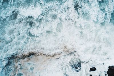 Waves splashing on rocks