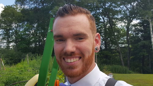 Portrait of smiling man in park