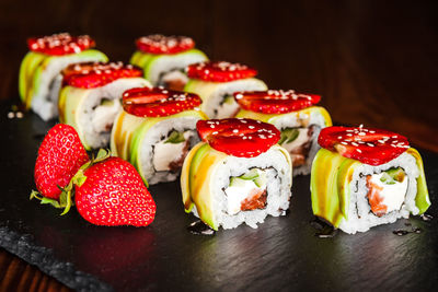 Close-up of sushi served on table