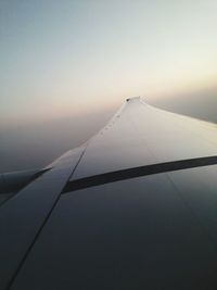 Cropped image of airplane wing