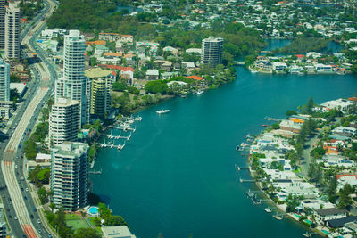 High angle view of buildings by sea