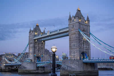 London tower bridge and a stree lamp against sky in the evening