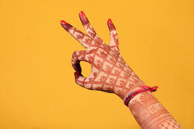 Close-up of woman hand with umbrella