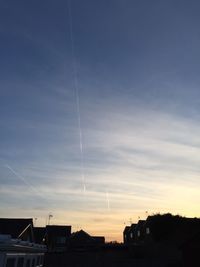 Built structure against sunset sky