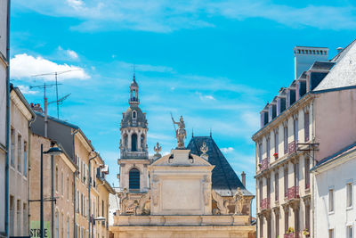 Low angle view of buildings against sky