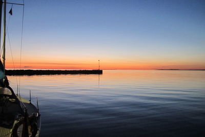 Scenic view of sunset over calm sea