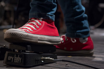 Close-up of woman wearing shoes