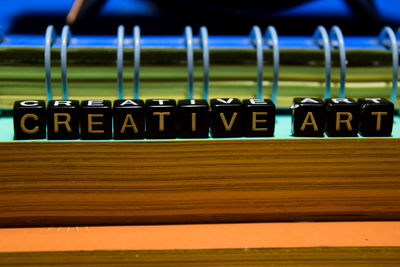 Close-up of text on wood