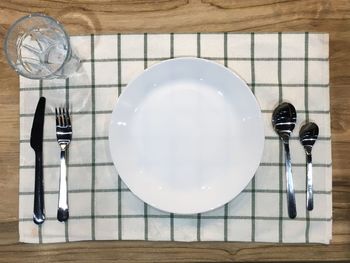 Close-up of empty plate on table