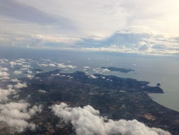 Aerial view of cloudscape over sea against sky