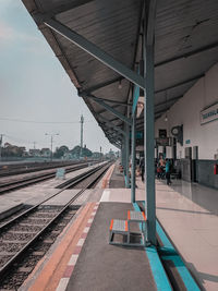 Railroad station platform against sky