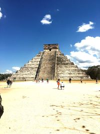 People at historical building