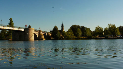 Bridge over river against sky