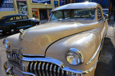 Close-up of vintage car on street