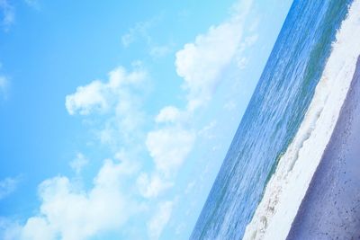 Scenic view of sea against blue sky