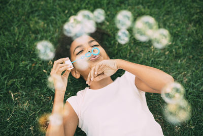 Young woman in grass