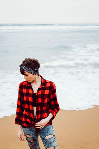 Full length of senior woman on beach