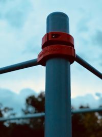 Low angle view of pole against sky