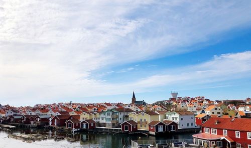 Buildings in city against sky