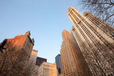 Low angle view of buildings against blue sky