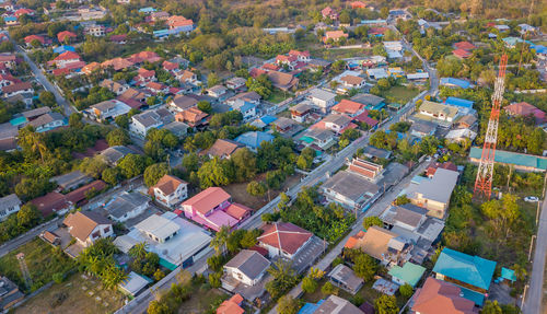 High angle view of townscape and trees in city