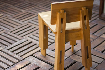 High angle view of chairs on table at home