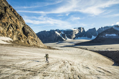 Backpacker treks across glacier in akshayak pass
