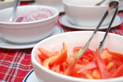 Close-up of fruits in bowl on table