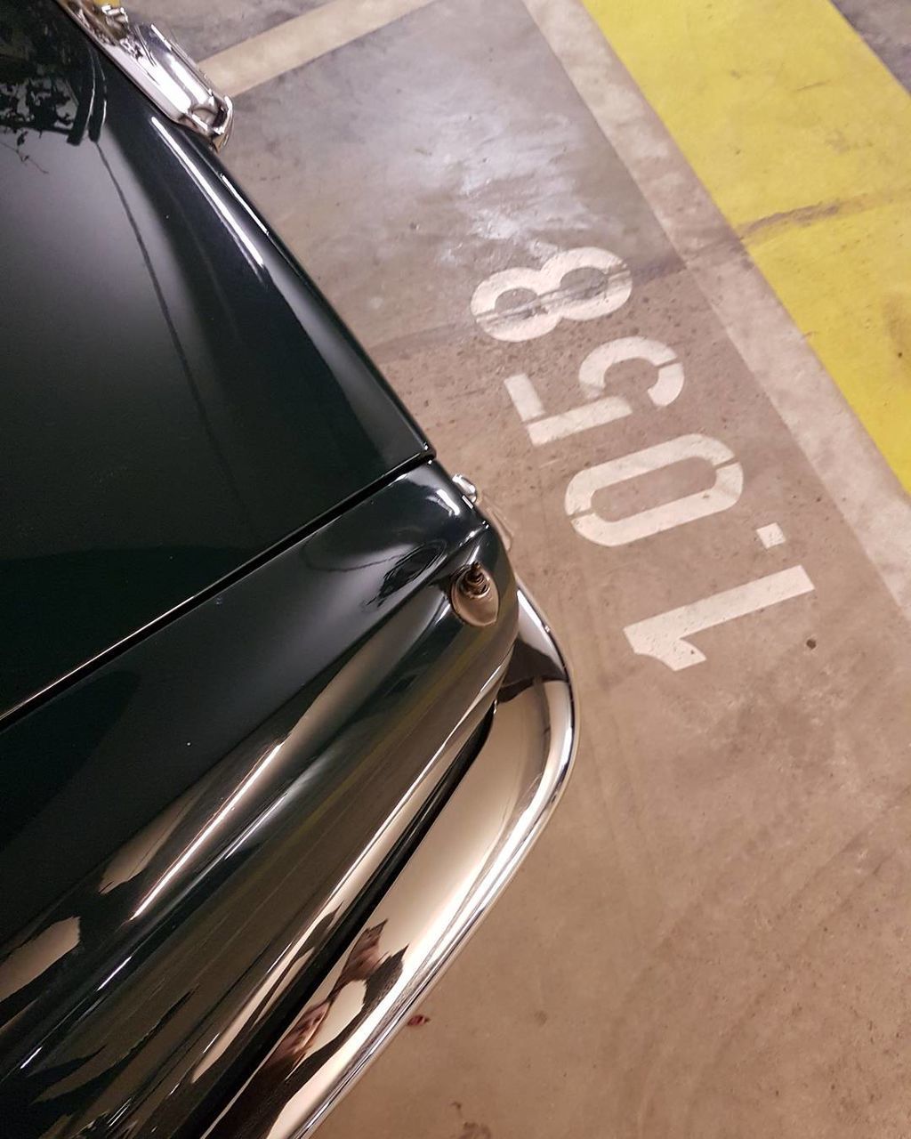 CLOSE-UP OF CARS ON ROAD