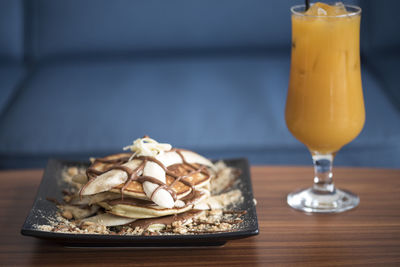 Close-up of drink in plate on table