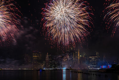 Firework display at night