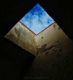 Low angle view of wall against sky