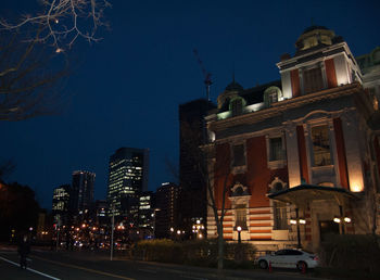 View of city lit up at night