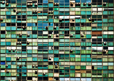 Full frame shot of building window during sunny day