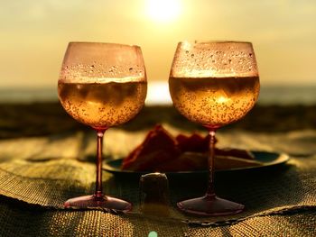 Close-up of beer glass on table